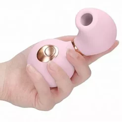 Shots Irresistible Irresistible Zuigende Vibrator Invincible - Roze -Clitoris Vibrators Verkoop zuigende vibrator invincible roze hand