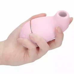 Shots Irresistible Irresistible - Zuigende Vibrator Kissable - Roze -Clitoris Vibrators Verkoop zuigende vibrator kissable roze hand